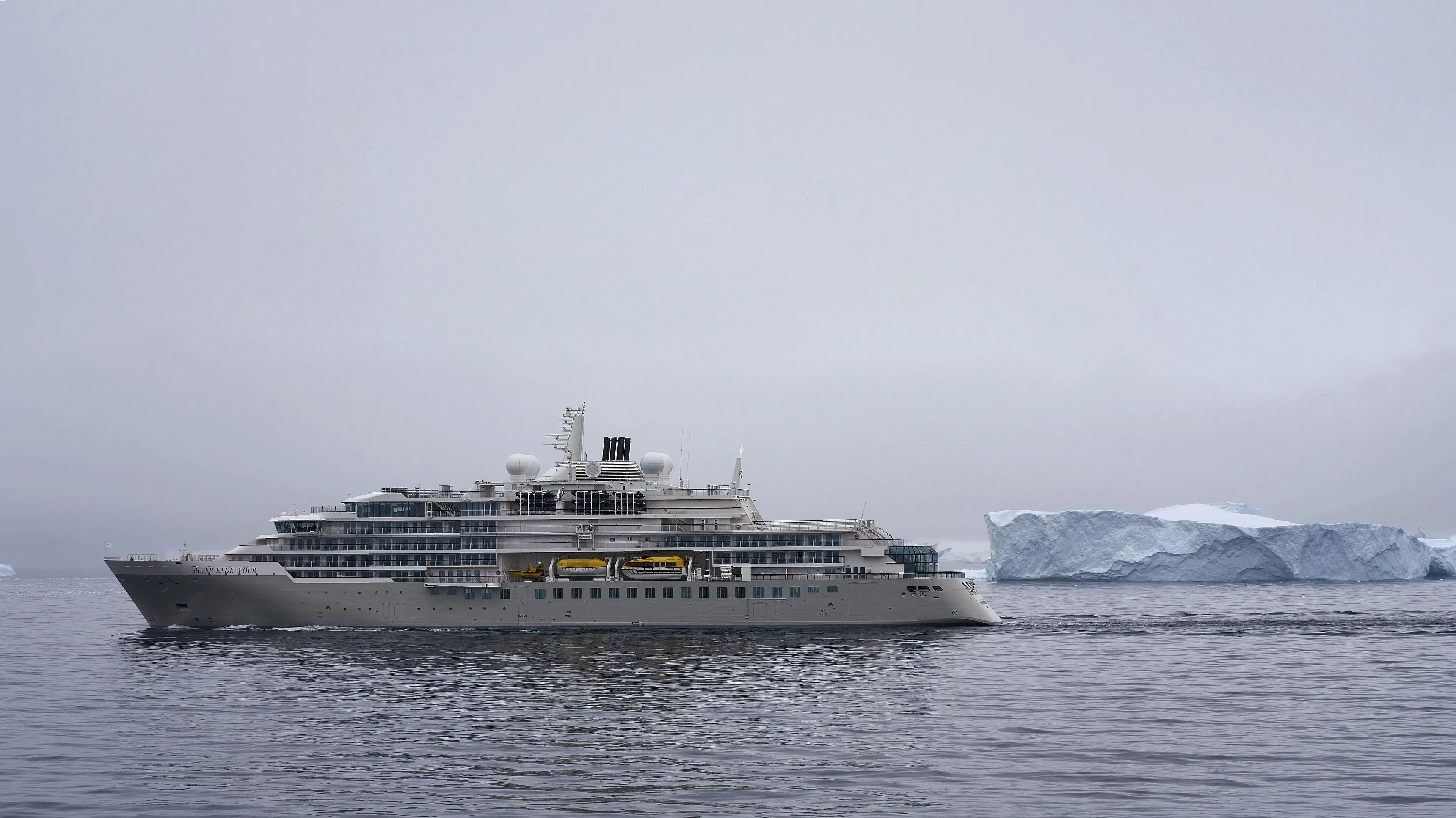 An expedition ship among icebergs in Antarctica